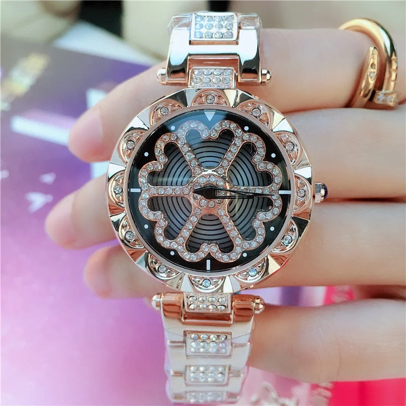 2019 New Designs Rotating Quartz Watch Waterproof Fashion Hollow Flower Zircon Steel Strap Watch for Women Jewelry